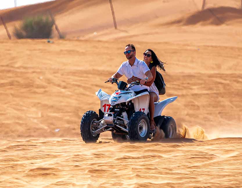 Private Morning Desert Safari Dubai with dune bashing, camel ride, sandboarding, and golden sunrise views