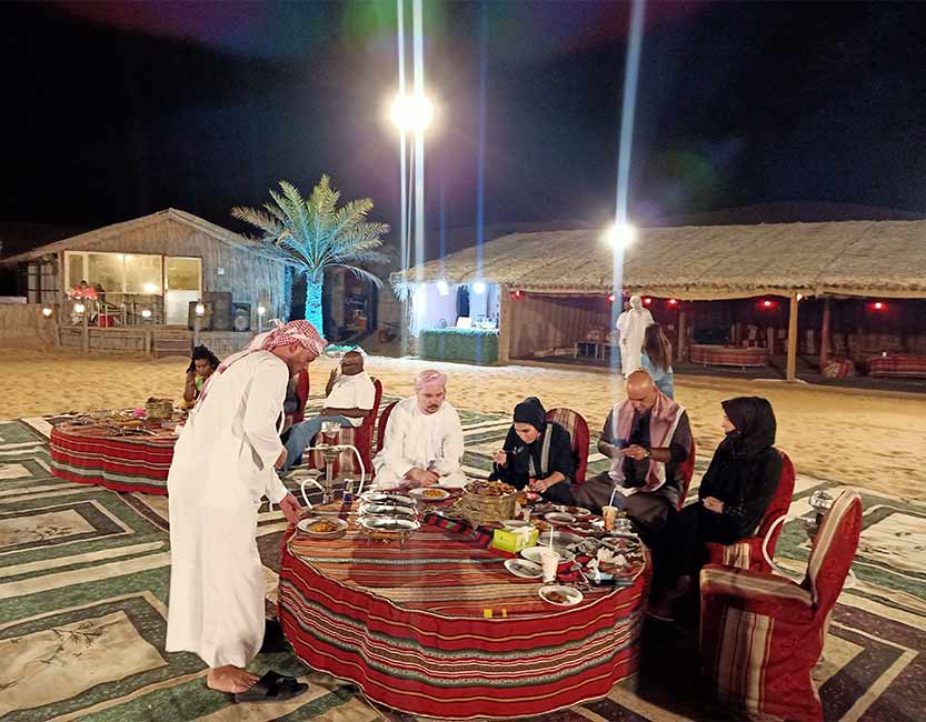 Desert Safari Dubai with VIP table service, dune bashing, private dining, camel rides, and live shows